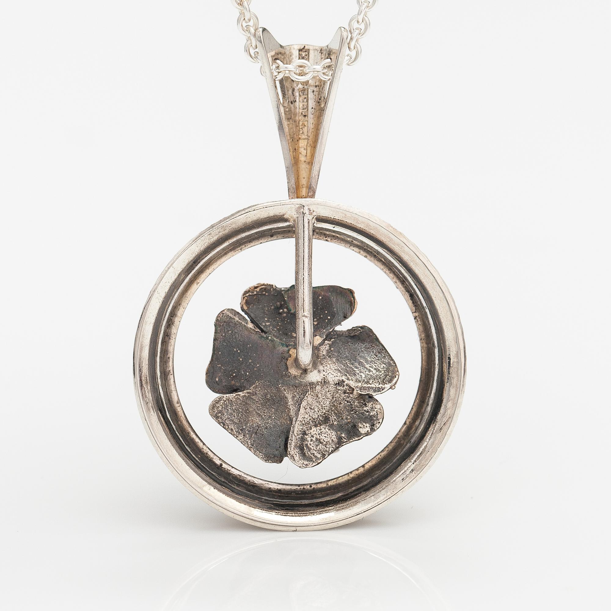 A silver ring and necklace. Martti Viikinniemi, Heinola 1972.