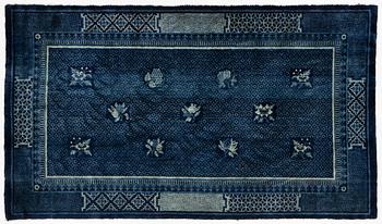An antique Baotou carpet, north China, c. 257 x 155 cm.