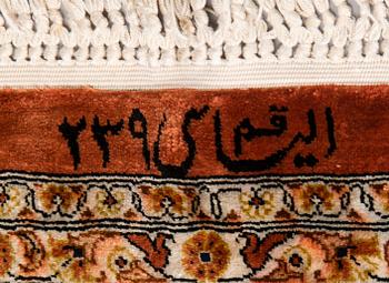 A SILK CARPET, Ghom, signed, 150x102 cm.