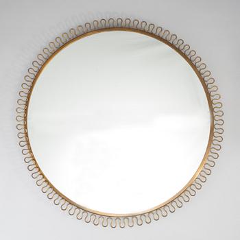 A Swedish Modern brass mirror, mid 20th century.