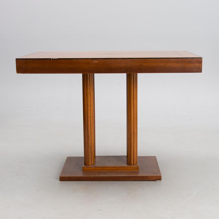 An early 20th century six-piece set of furniture by Armas Lindgren and Onni Tarjanne.