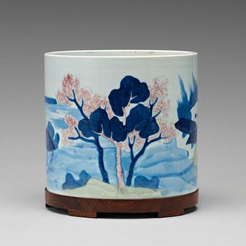 802. An underglaze blue, copper-red and celadon-glazed brushpot, Qing dynasty, early 18th Century, with Chenghuas mark.