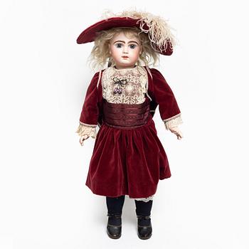 Girl doll, likely France, around the year 1900.