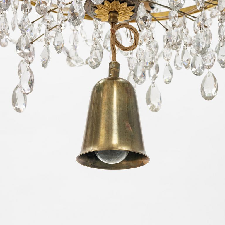 A Gustavian style chandelier with older parts, late 18th and 20th century.