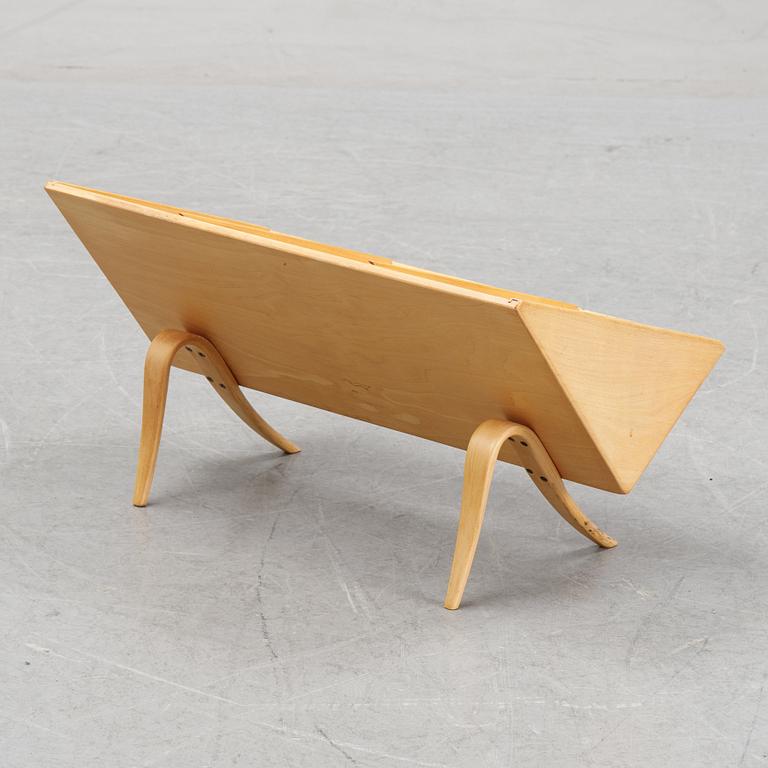 A model T 709 book stand by Bruno Mathsson for Firma Karl Mathsson, dated 1967.
