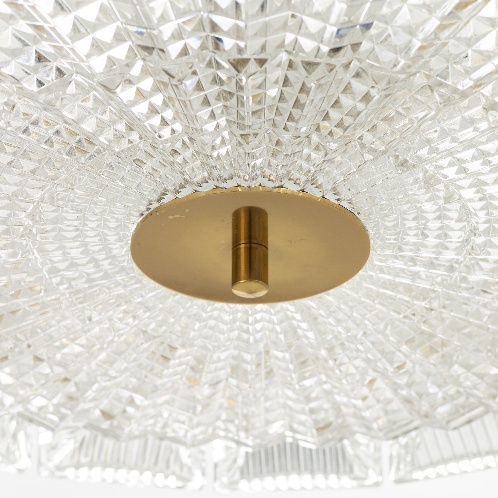 Carl Fagerlund, a glass and brass ceiling light, Orrefors.
