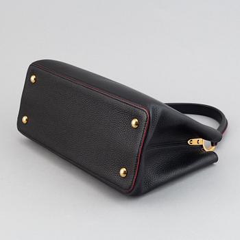 Louis Vuitton, a 'Capucines MM' Taurillon leather, 2015.