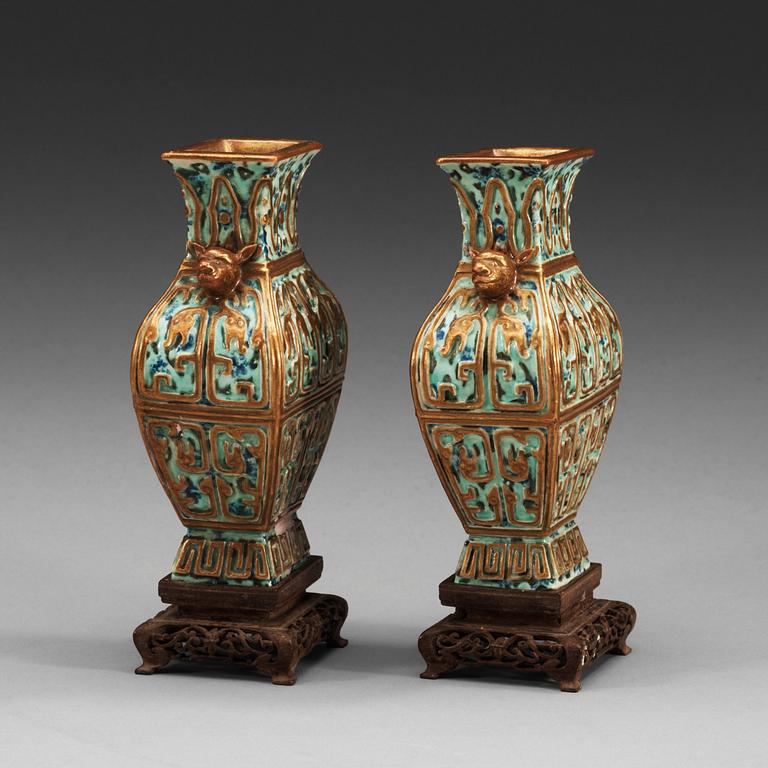 A pair of vases, late Qing dynasty (1644-1912), with Qianlong sealmark.