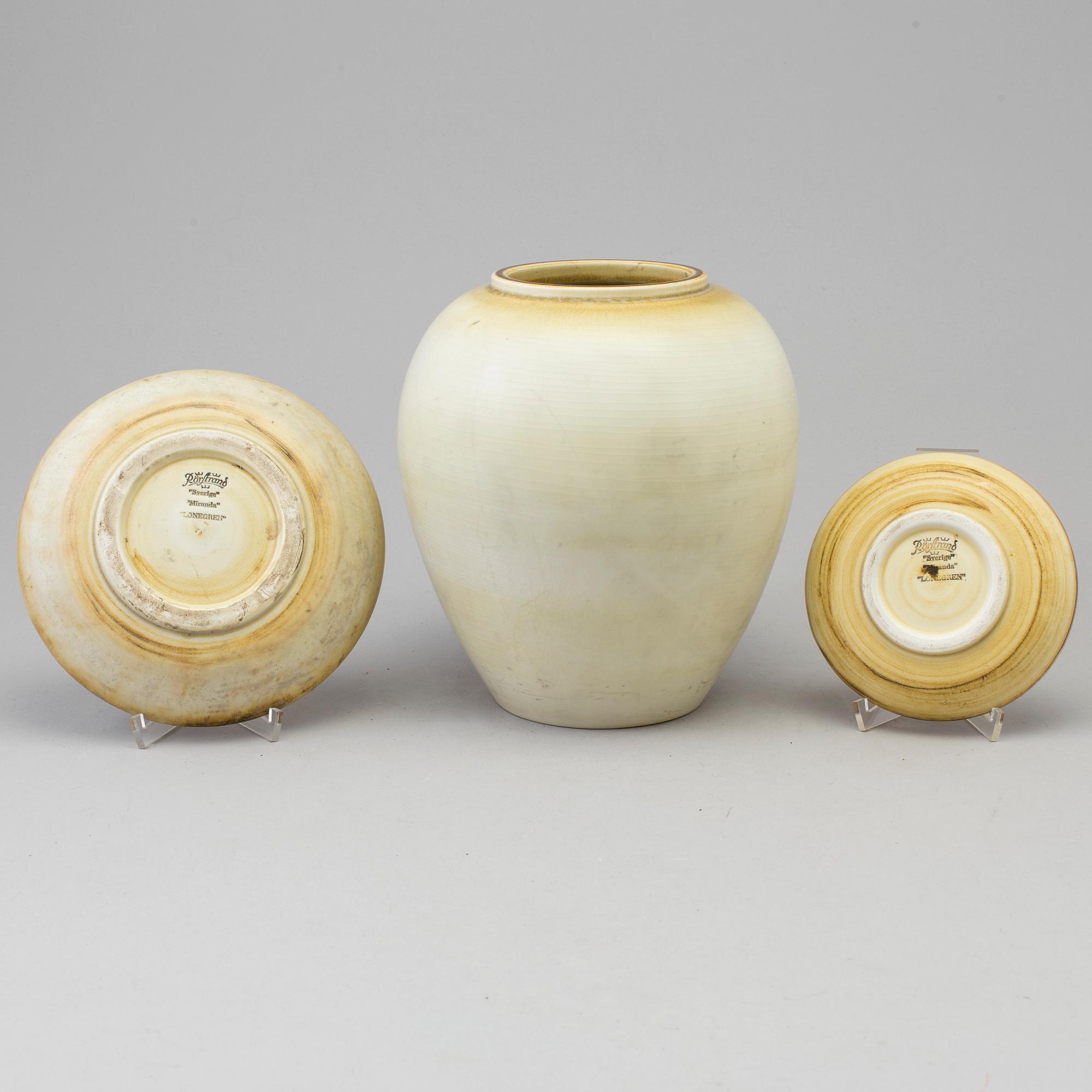 GERTRUD LÖNEGREN, a stoneware vase and two plates, Rörstrand.