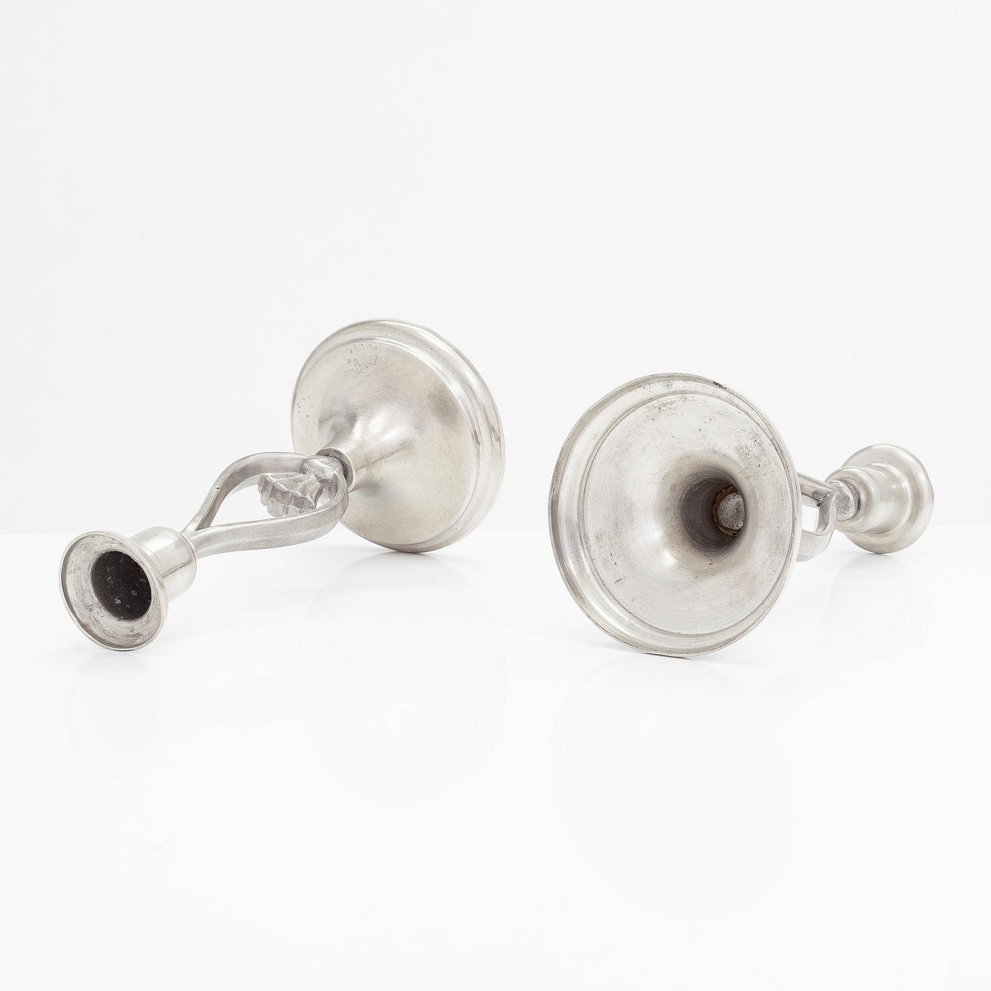 Paavo Tynell, two pairs of 1930s candlesticks for Taito.