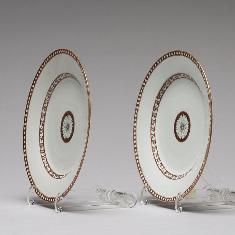 A pair of blue and white plates, Qing dynasty, Qianlong (1736-95). With the year 1789 written to the reverse.