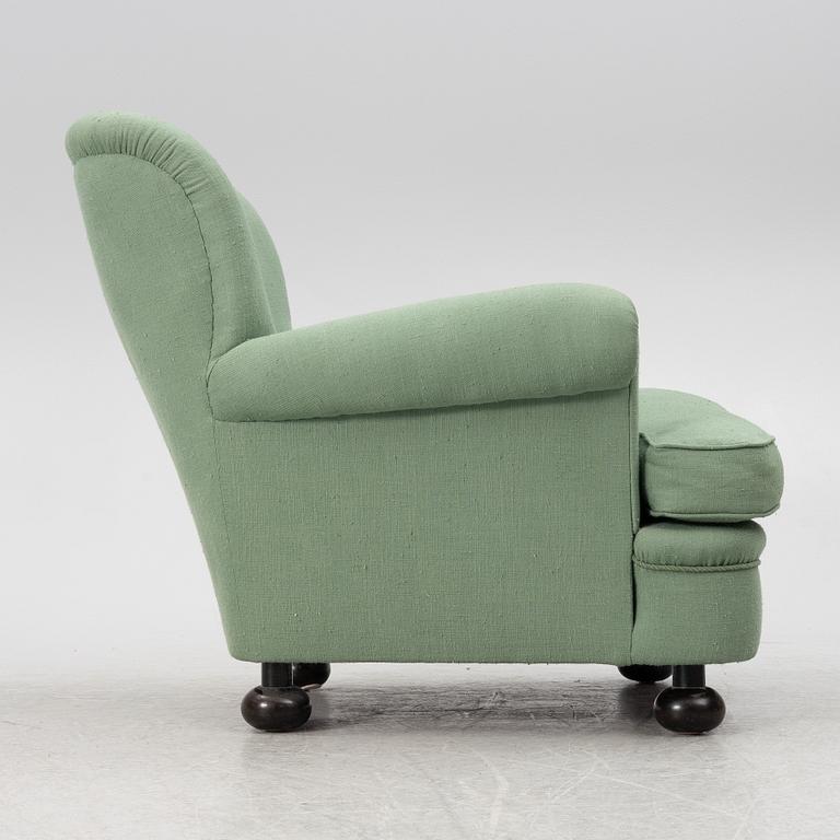 Josef Frank, a model 336 armchair, Firma Svenskt Tenn, Sweden.