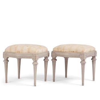 70. A pair of late Gustavian stools by Johan Hammarström, master in Stockholm 1794-1812.