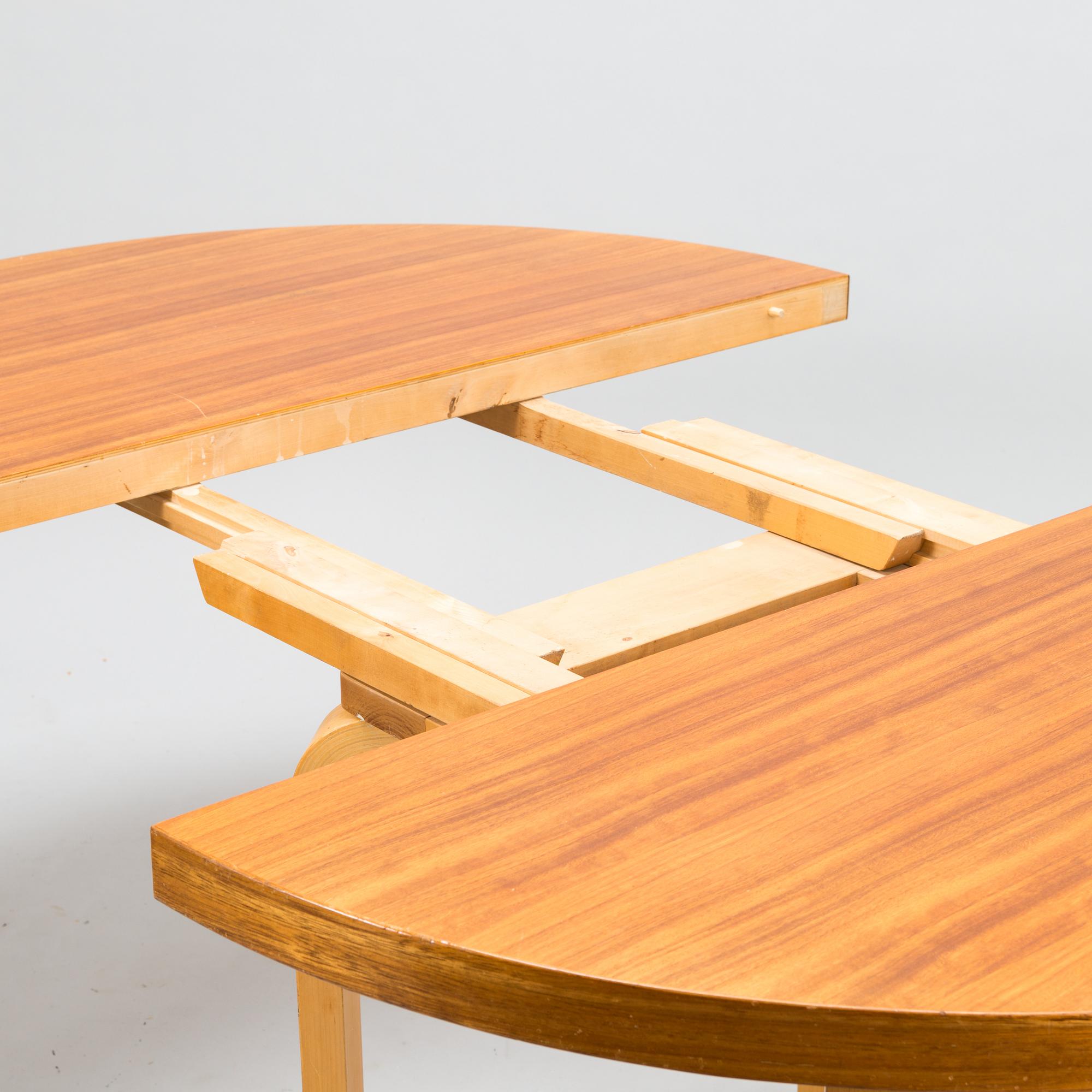 ALVAR AALTO, A 1950s dinner table, O.Y. Huonekalu- ja Rakennustyötehdas A.B., Finland.