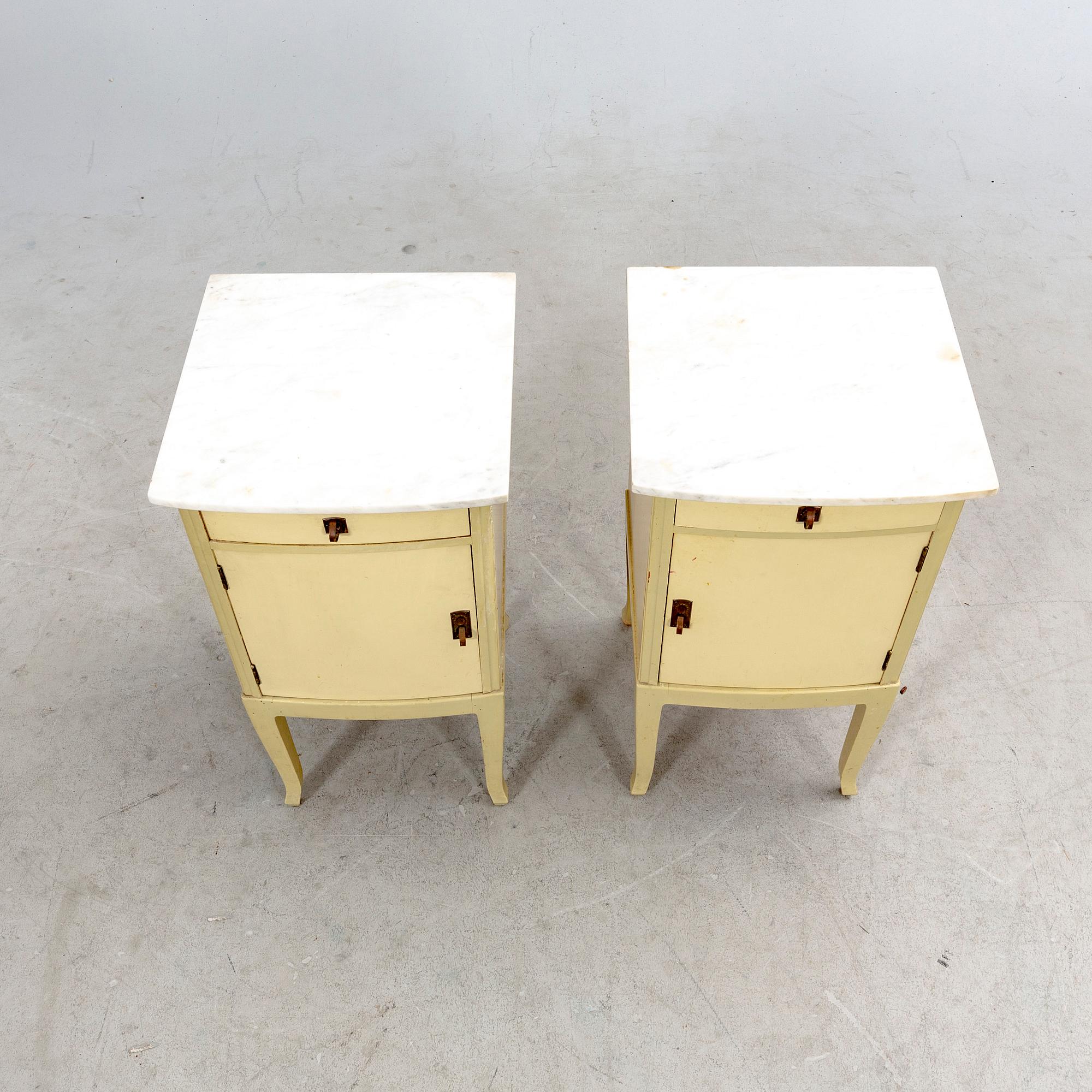 A pair of painted bedside tables first half of the 20th century.