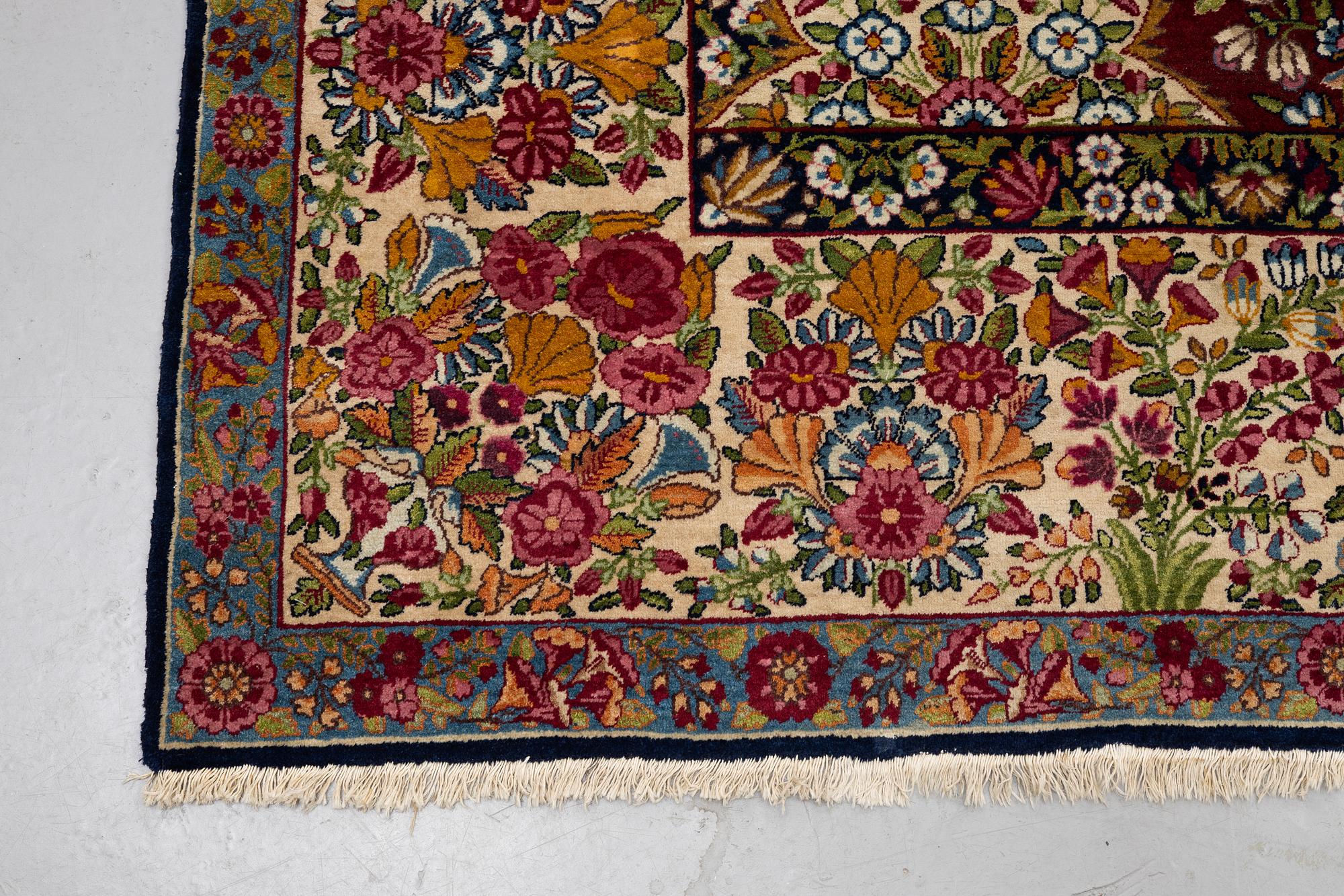 A carpet, semi-antique Kerman, ca 453 x 340 cm.