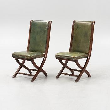 A set of five mahogany and leather upholstered chairs, England, second half of the 20th Century.