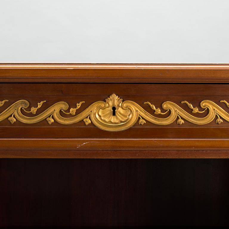A 20th-century Louis XVI style bookcase.