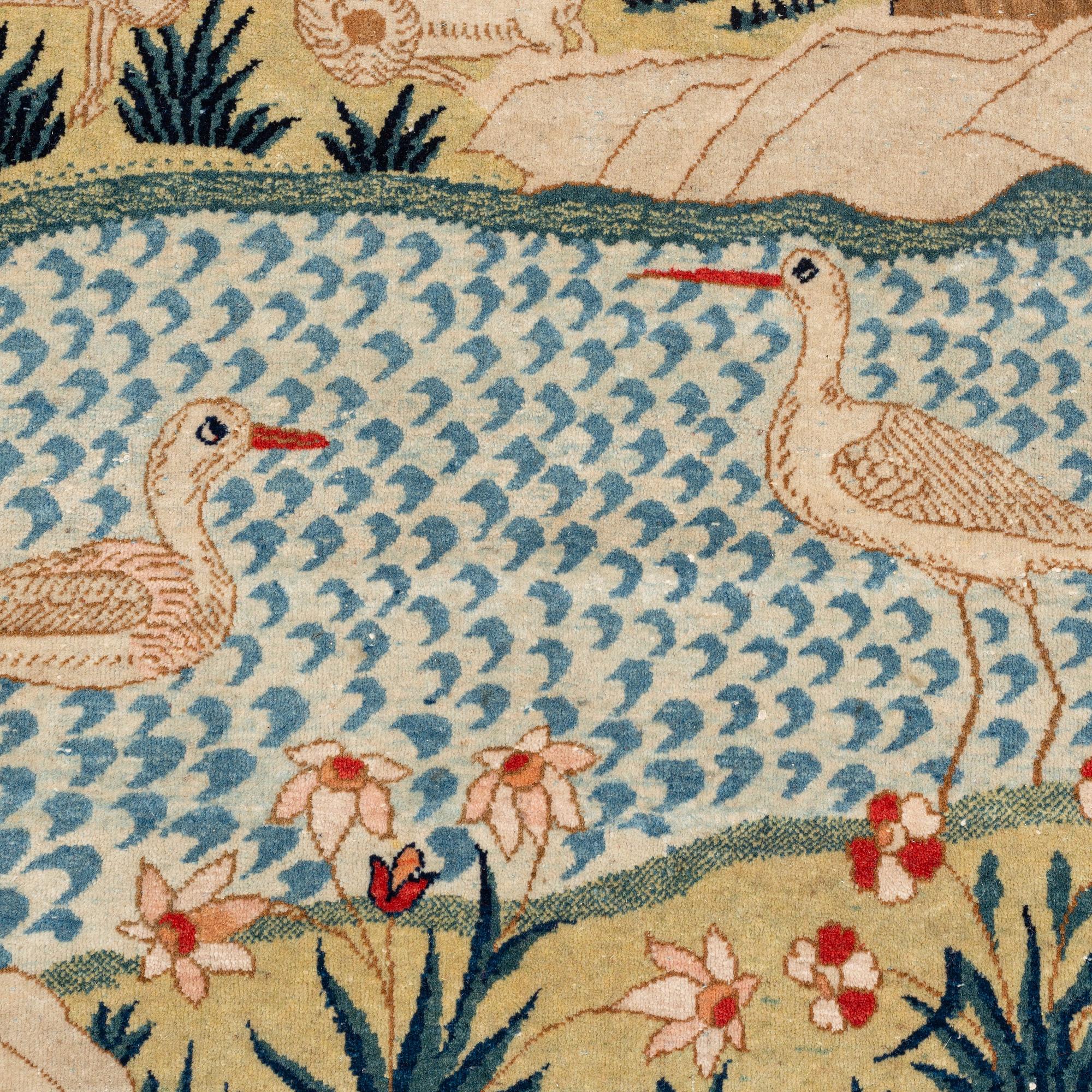 An antique/semi-antique pictoral Kashan rug, ca 215 x 140-144 cm.
