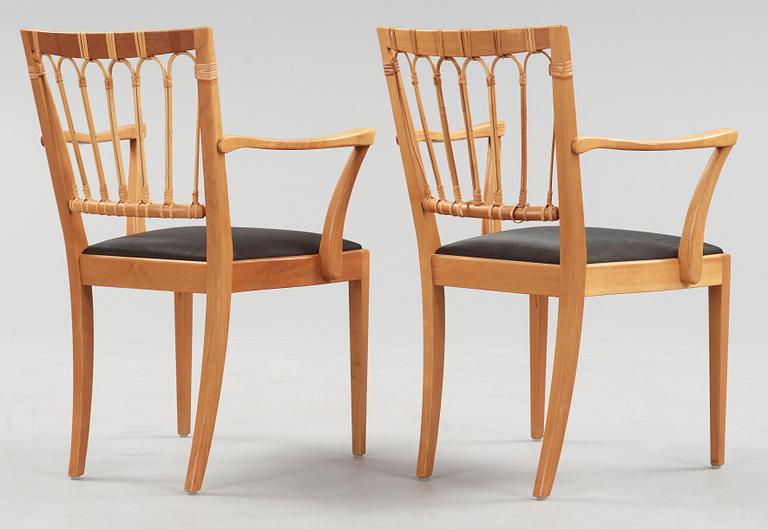 A pair of Josef Frank mahogany and rattan armchairs, Svenskt Tenn, model 1165.