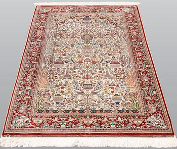 A oriental silk rug, 155 x 93 cm.