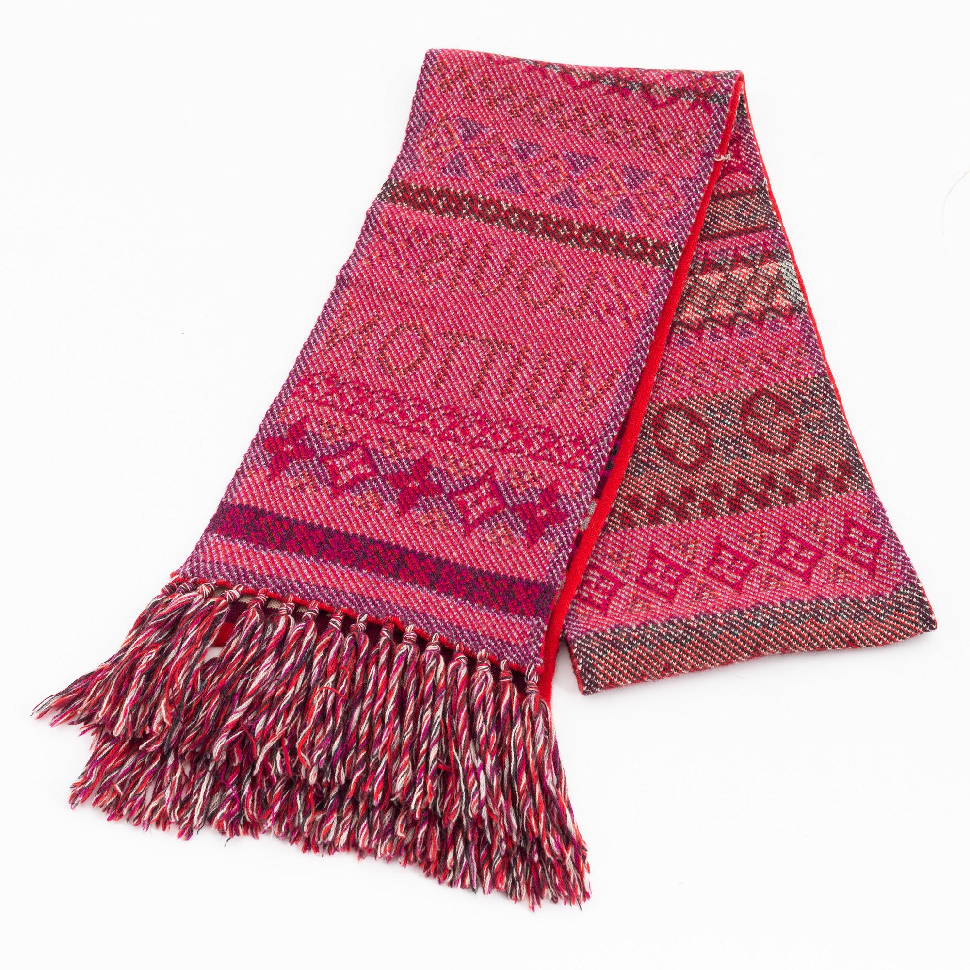 Louis Vuitton, a knitted cashmere hat and scarf.