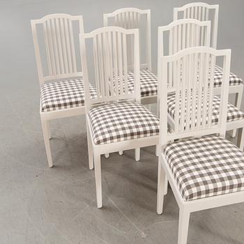 A set of six painted chairs around 1900.