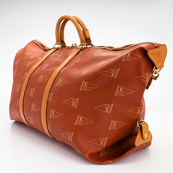 Louis Vuitton, an 'America's Cup Canvas Duffle' travel bag.