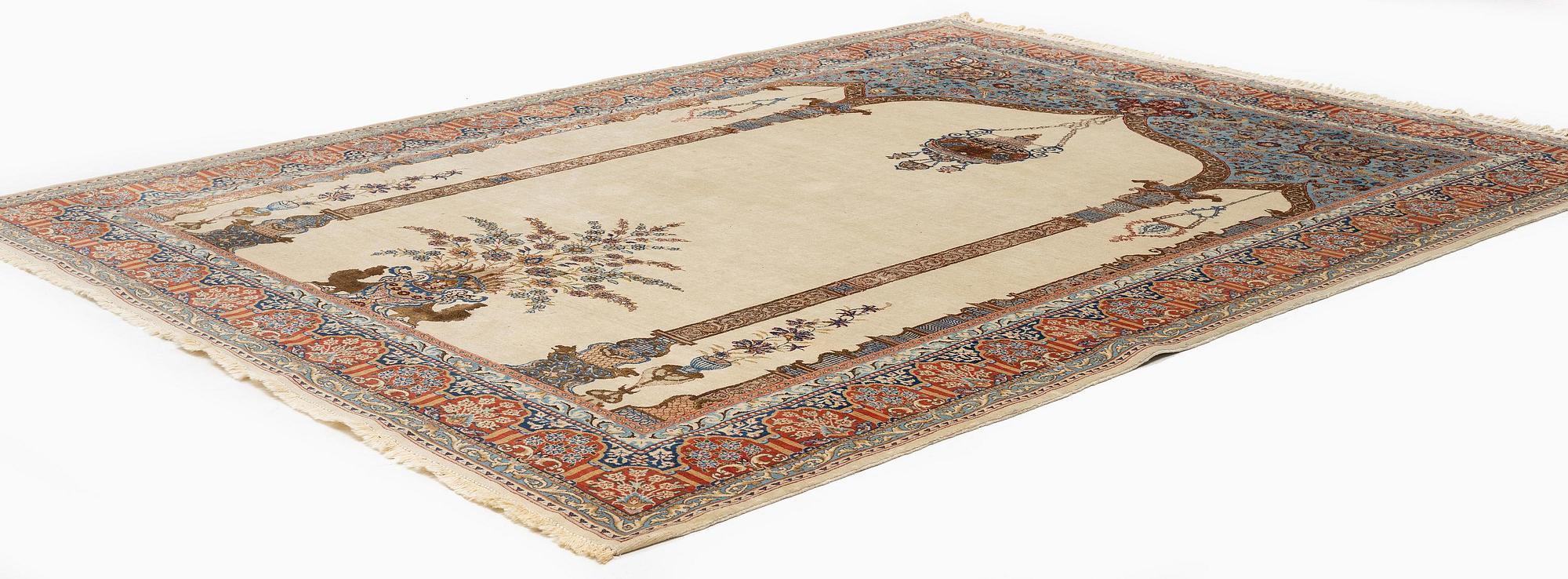 A Tabriz carpet, part silk, Northwest Persia (Iran), c. 323 x 246 cm.