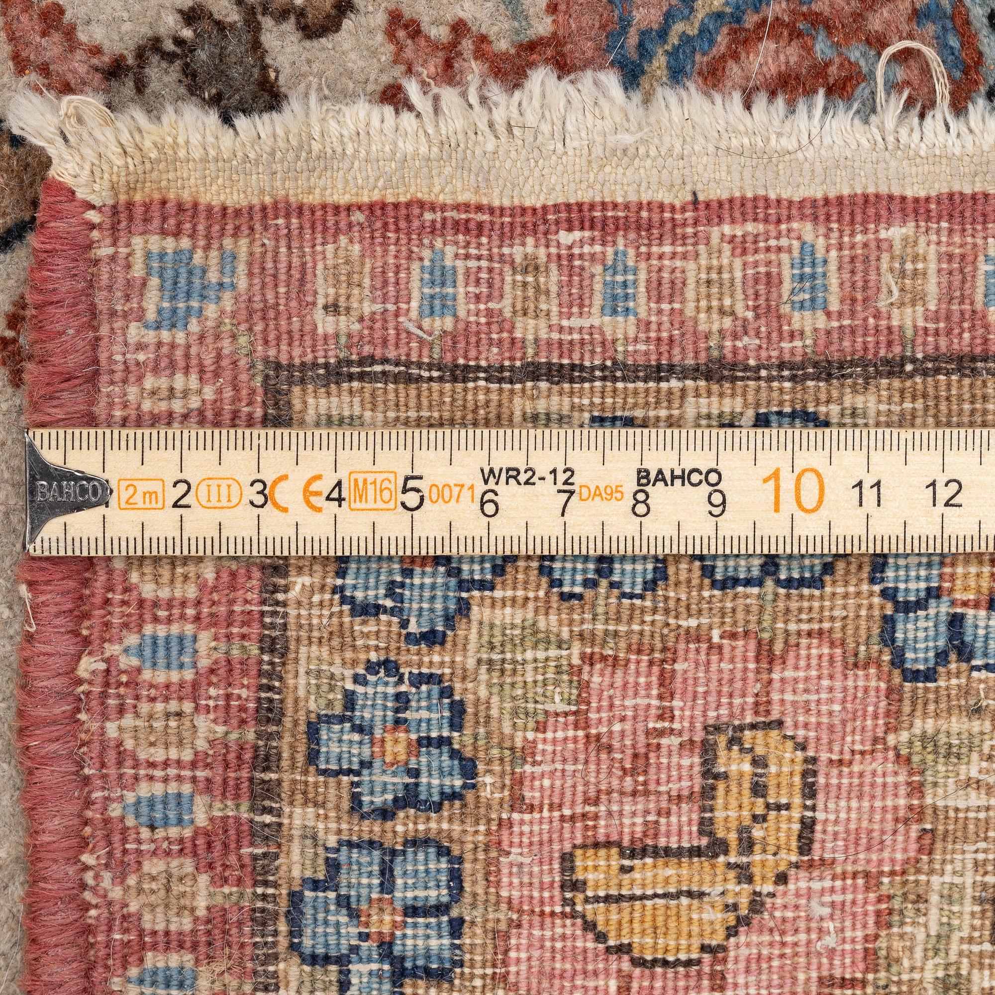 Rug, Kirman, semi-antique, approx. 370 x 267 cm.