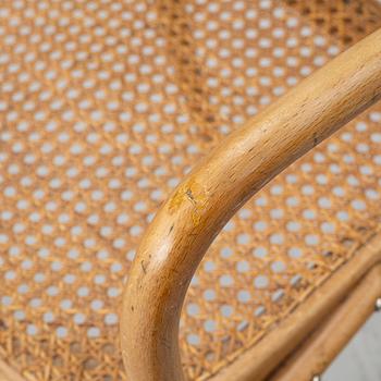 A matched pair of armchairs from Thonet, circa 1900 and late 20th Century.
