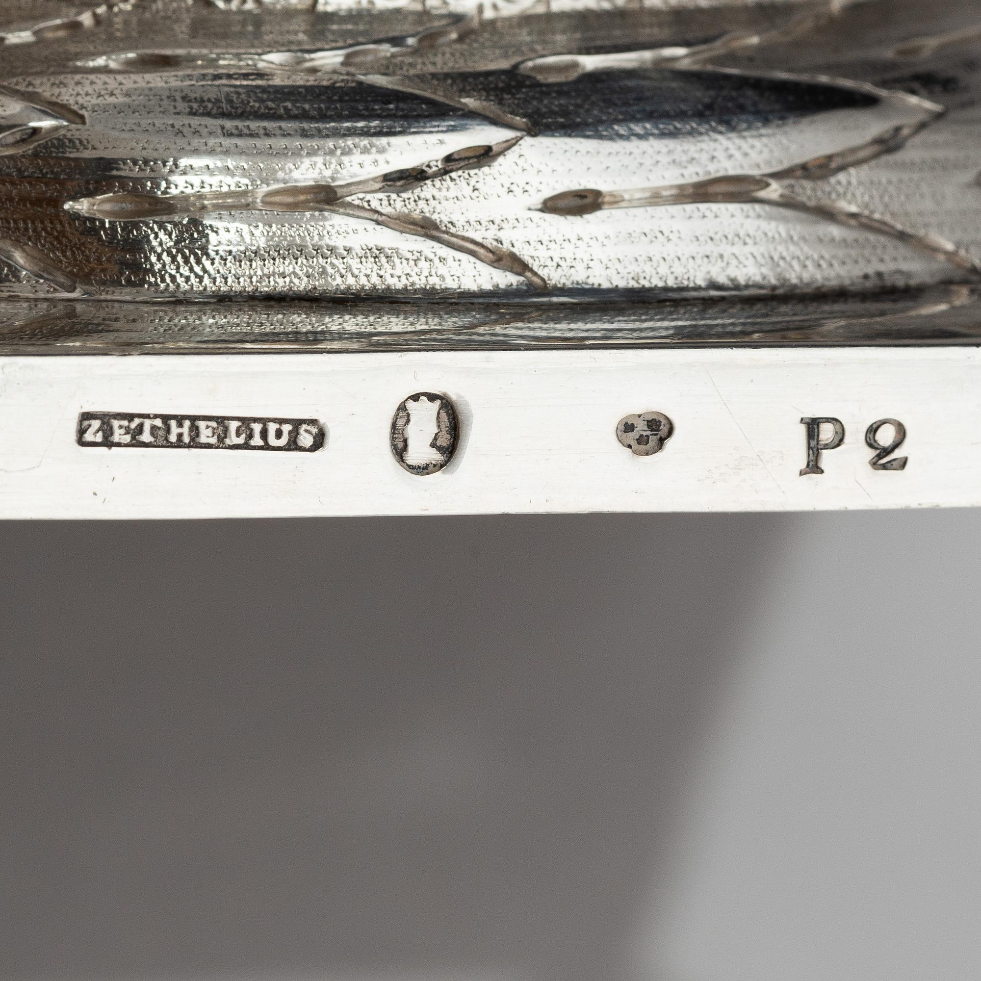 A pair of Swedish 18th century silver candelsticks, marks of Pehr Zethelius, Stockholm 1797.
