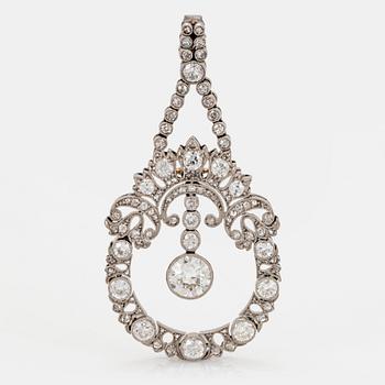 1066. A platinum pendant set with old-, eight and rose-cut diamonds.