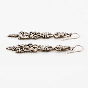 Demi parure, a pair of earrings, and a brooch, with so-called steel diamonds, 19th century.