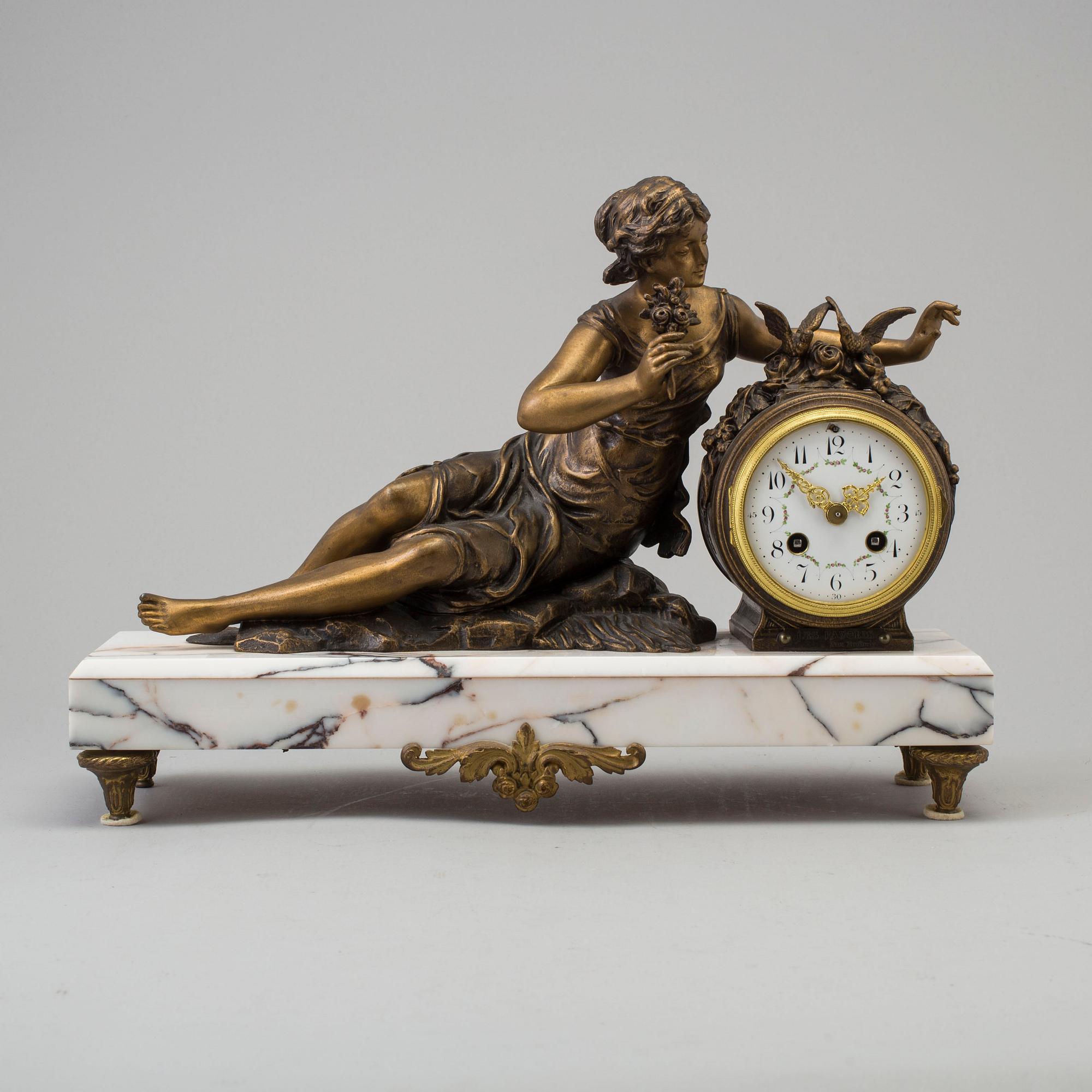 a circa 1900 mantle clock, marked Ruffony.