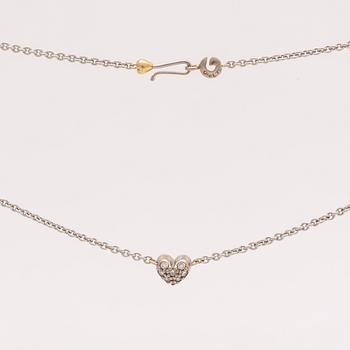 Lynggaard pendant on cjain, 18k whitegold brilliant-cut diamonds 0,08 ct, width heart approx 5 mm, length 40 cm, dustbag.