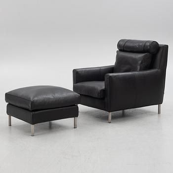 A "Streamline" armchair with ottoman, Eilersen, 21st century.