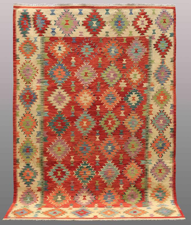 A carpet, KIlim, ca 296 x 197 cm.