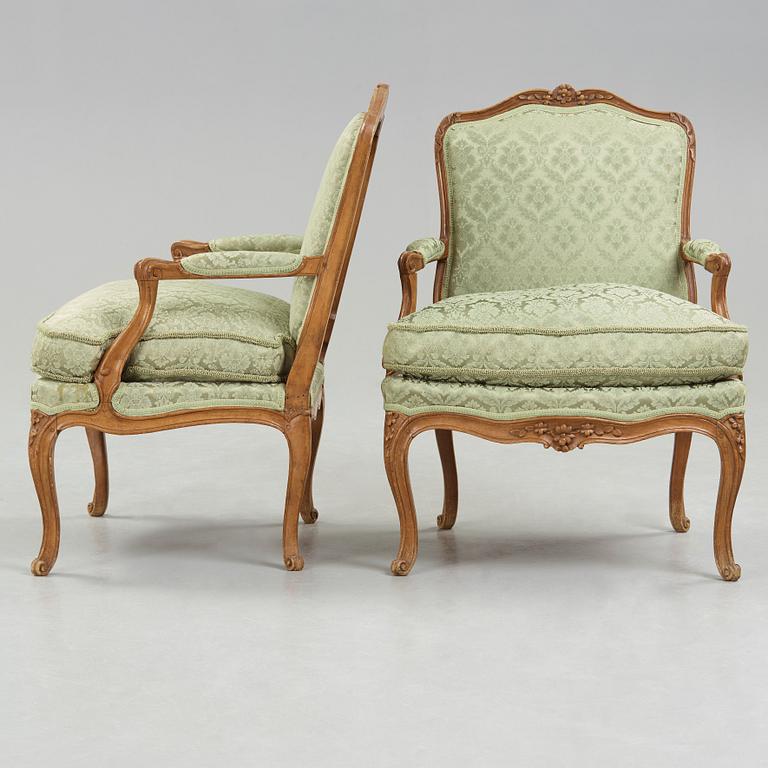 A pair of Louis XV 18th century armchairs.