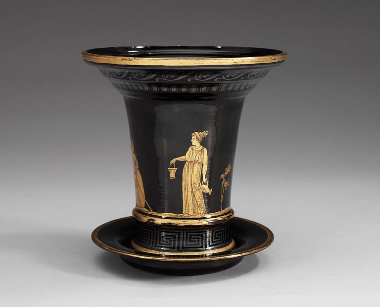 A Russian gilt black Etruscan style glass cache-pot with stand, circa 1800.