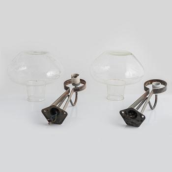 A pair of Swedish Modern wall lamps, ASEA, mid 20th Century.