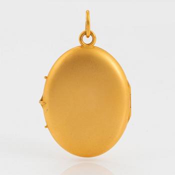 A 14K gold locket.