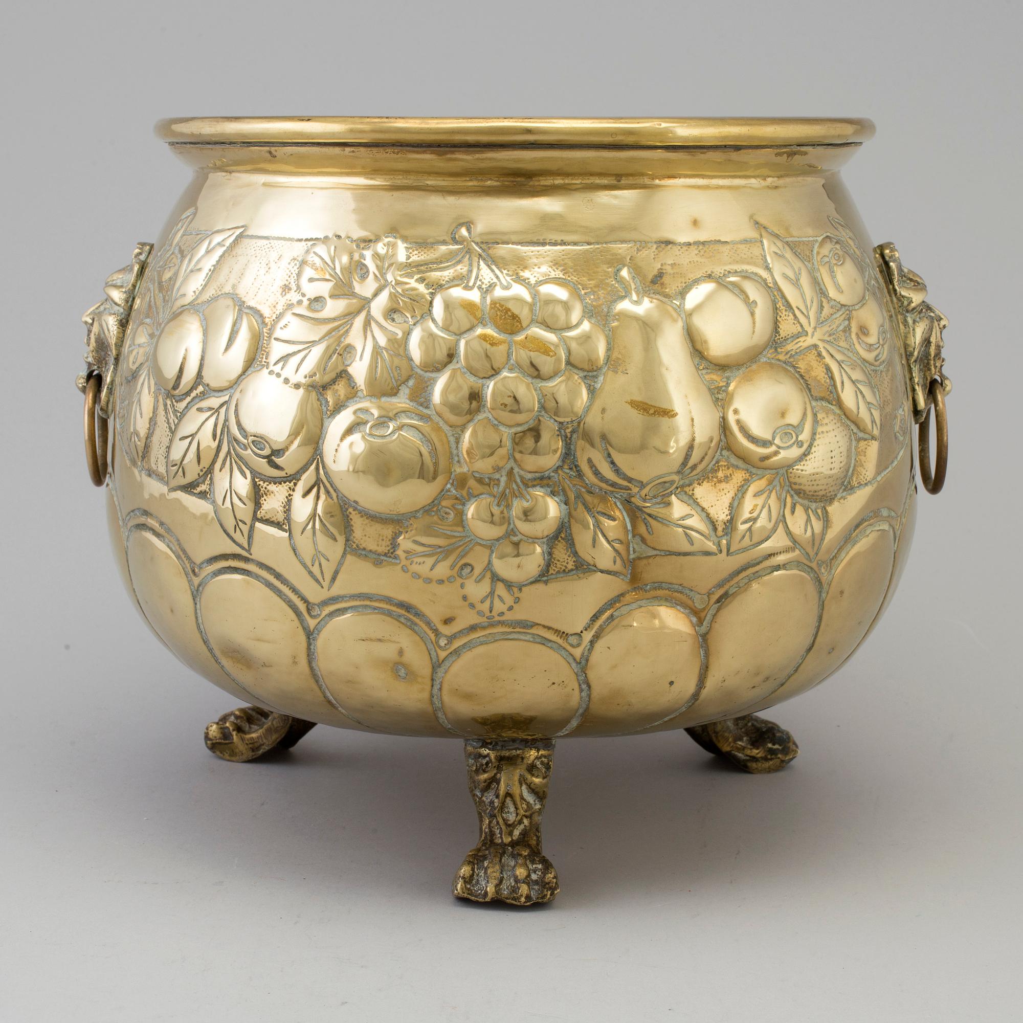 A 18th century brass flower pot.