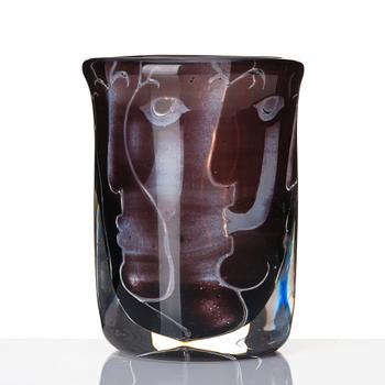 Ingeborg Lundin, an 'ariel' burgundy coloured glass vase decorated with faces, Orrefors Sweden 1972.