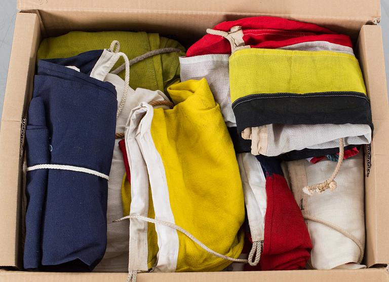 A SET OF NAUTICAL SIGNAL FLAGS.