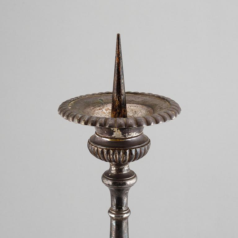 An 18th century bronze candlestick.