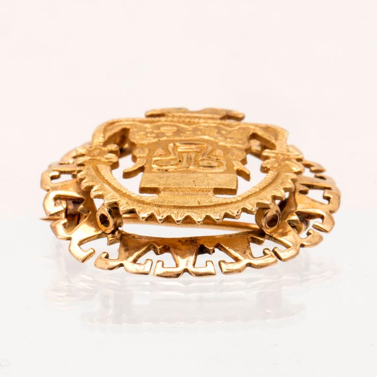 Brosch 18K guld Sydamerika.
