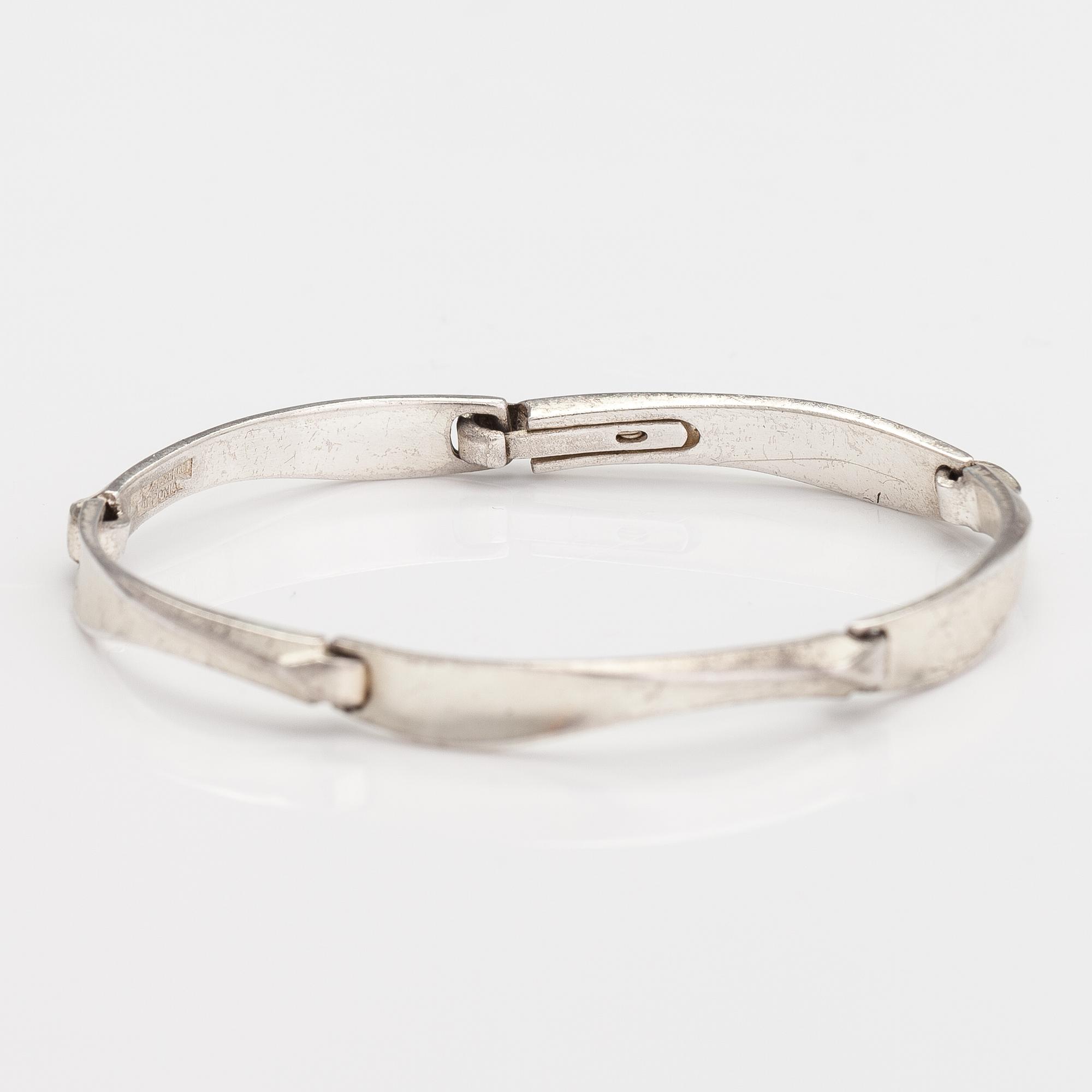 LAPPONIA, A sterling silver necklace, bracelet, brooch and earrings. 1984-87.