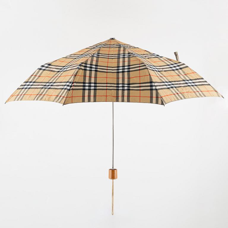 Burberry, an umbrella.