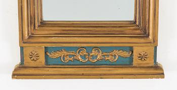 An Empire mirror marked W Lind, first half of the 19th century.